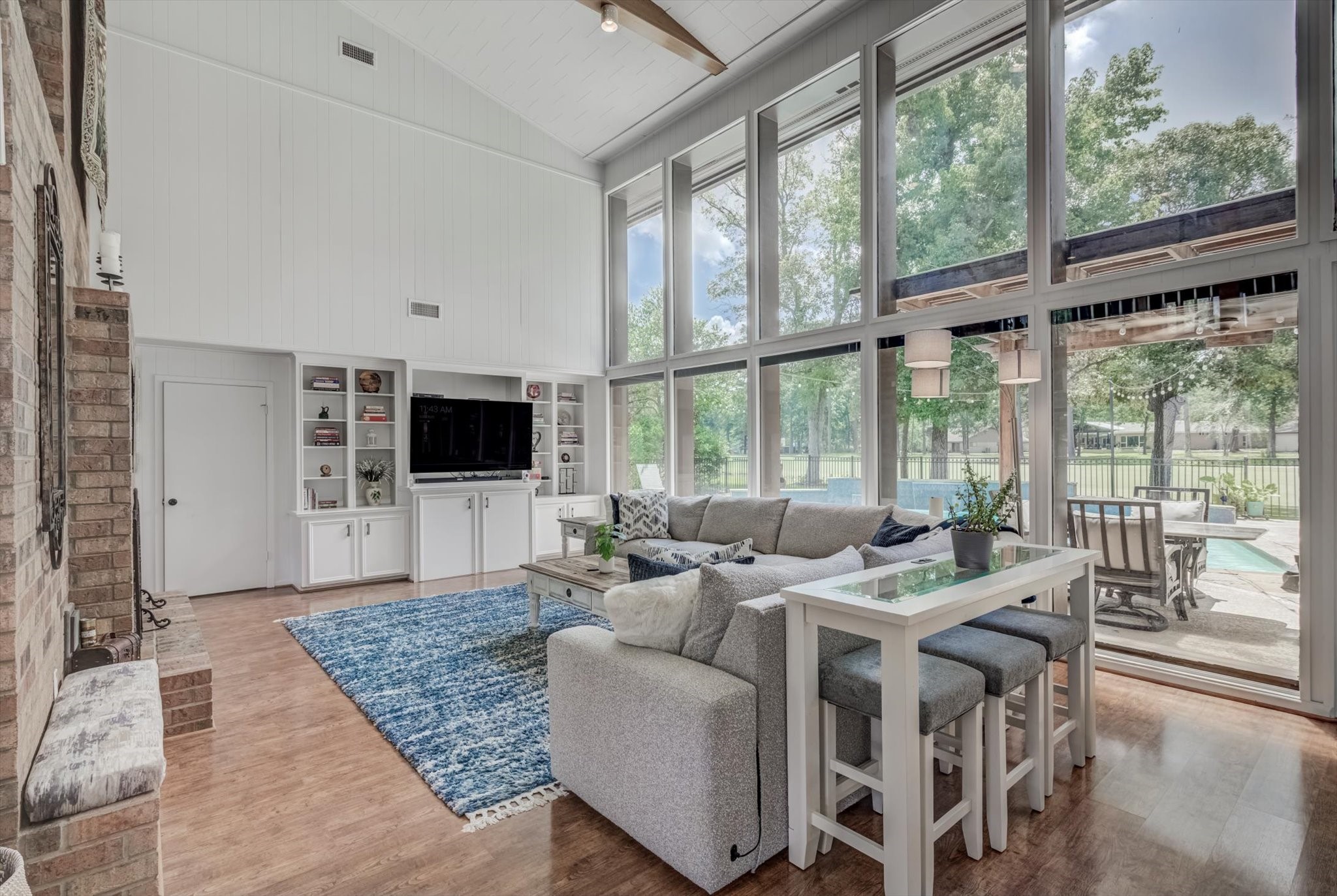 22 Winged Foot Drive Conroe, TX 77304 - Photo 7 of 49 a living room with furniture tv and a large window