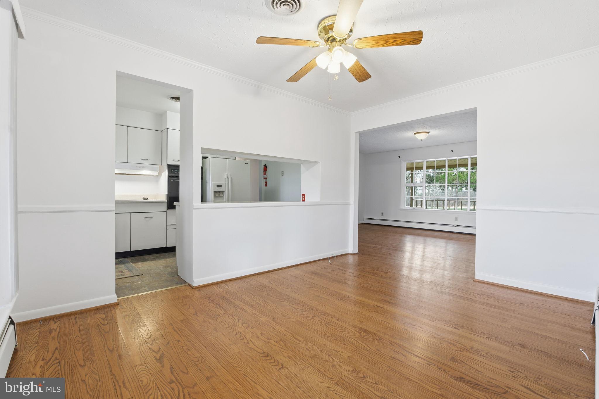 4008 Rock Run Road Havre de Grace, MD 21078 - Photo 6 of 28 a view of a kitchen with an empty room and window