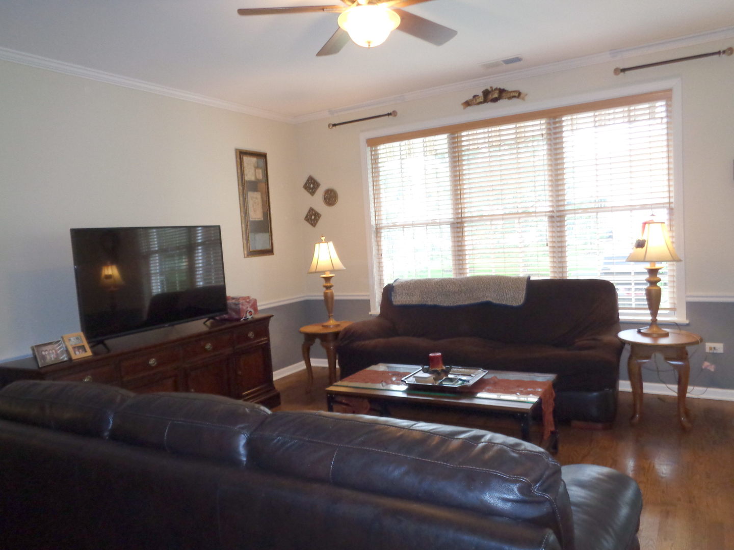 2521 Rolling Ridge Elgin, IL 60124 - Photo 8 of 16 a living room with furniture and a flat screen tv