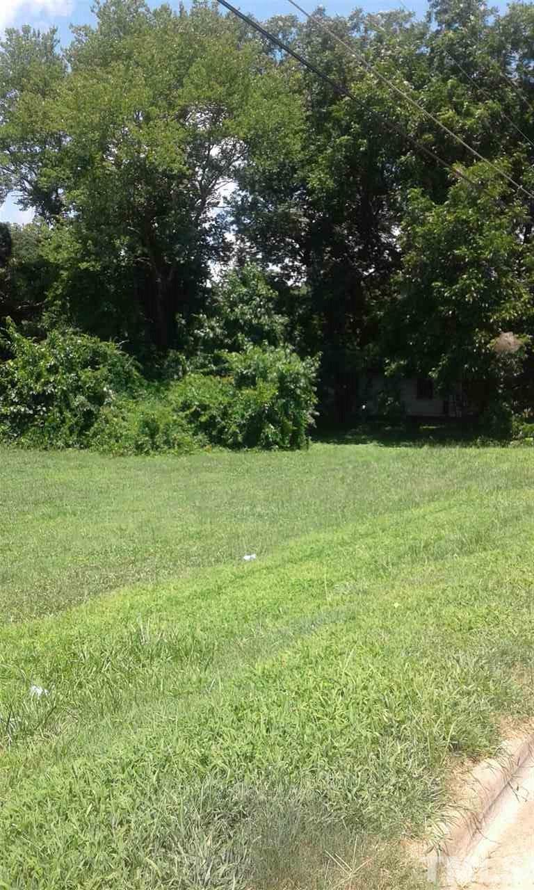 421 Como Drive, Unit 427 Raleigh, NC 27610 - Photo 1 of 3 a view of green field with trees in the background