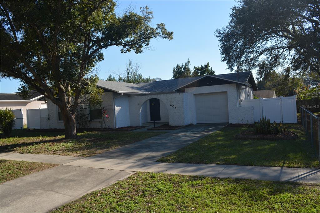 206 West Wheeler Road Seffner, FL 33584 - Photo 1 of 1 a view of a house with a yard