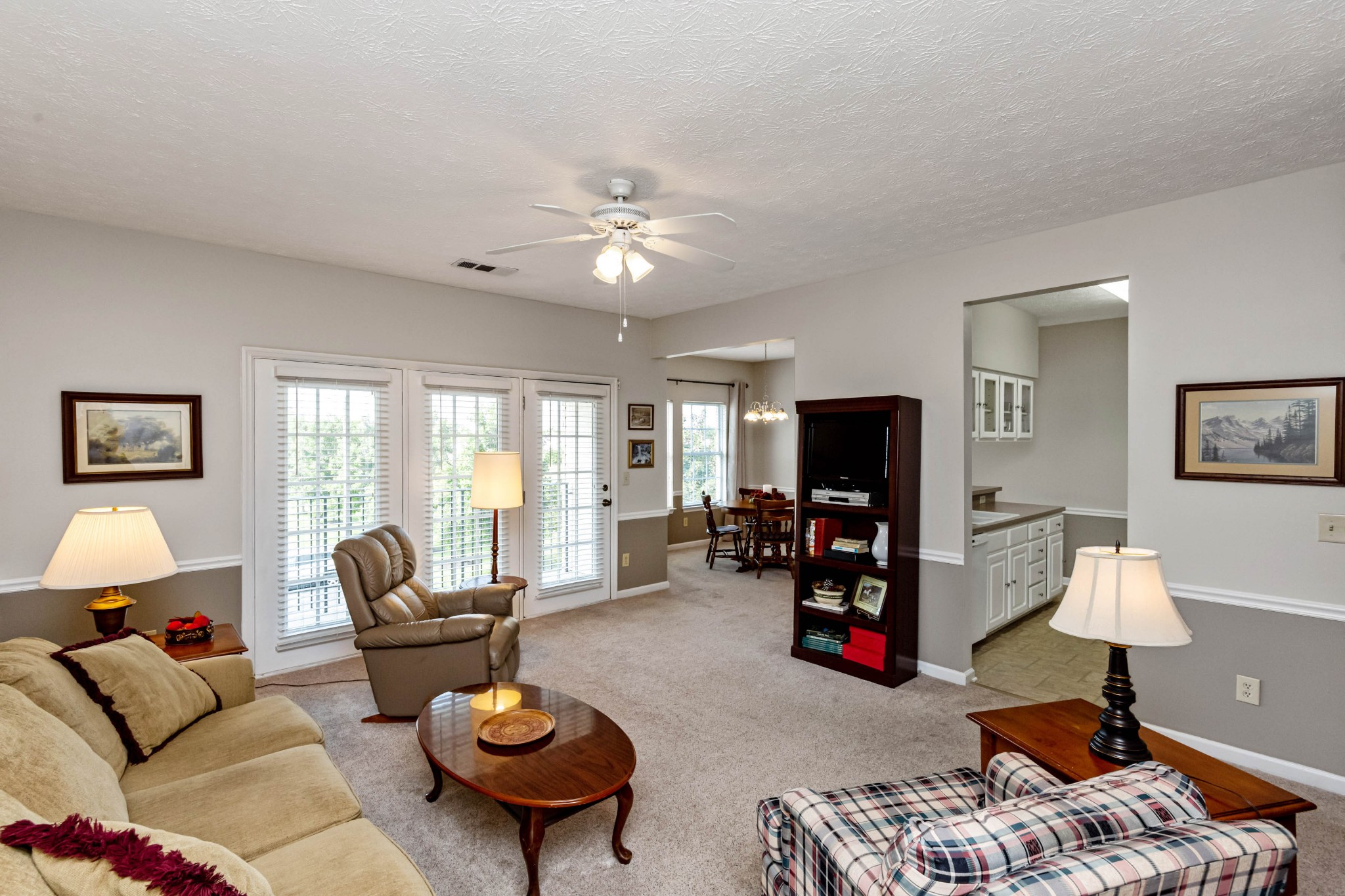 910 Churchill Crossing Madison, TN 37115 - Photo 2 of 25 a living room with furniture and a flat screen tv