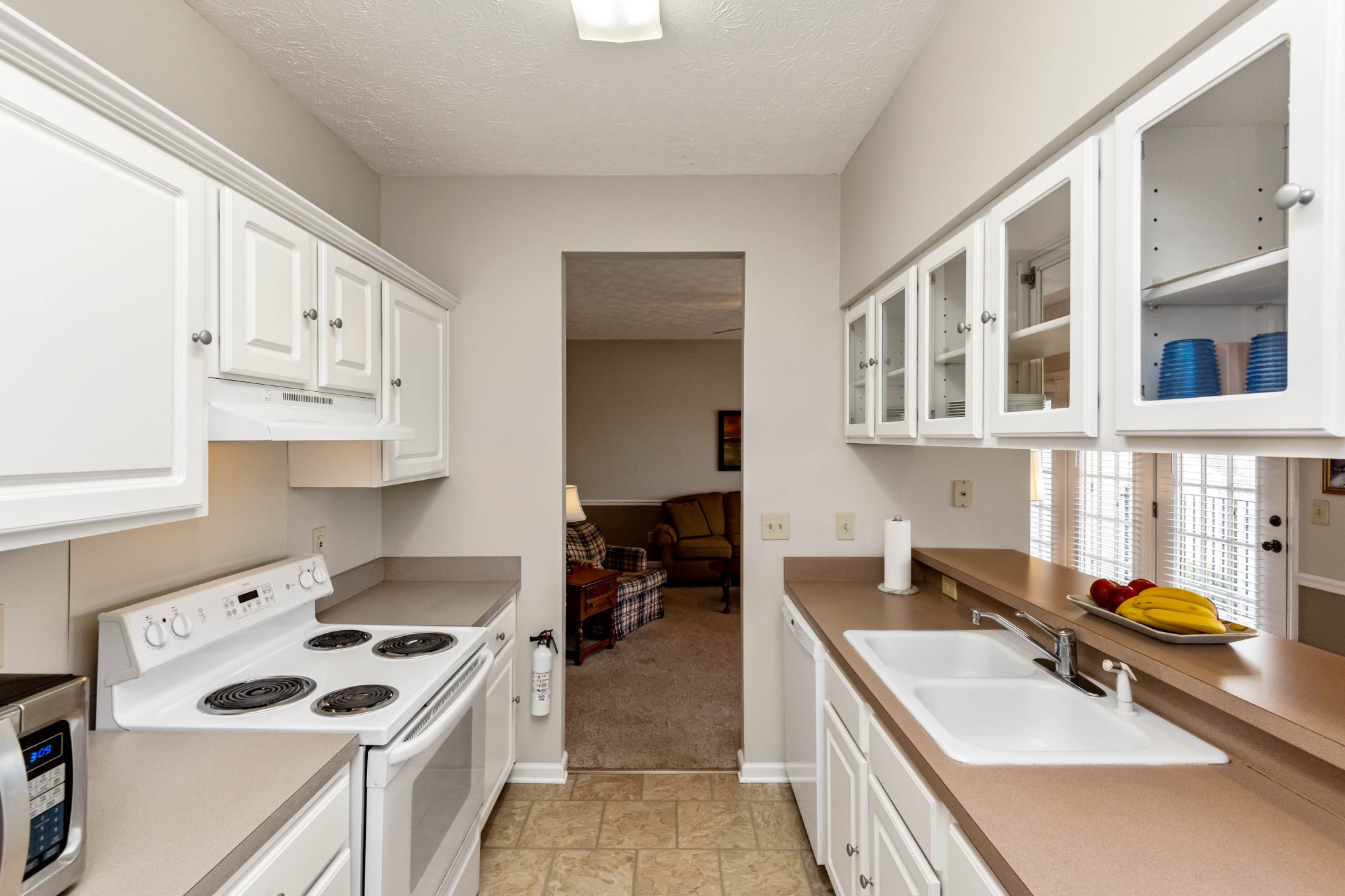 910 Churchill Crossing Madison, TN 37115 - Photo 11 of 25 a kitchen with stainless steel appliances a stove a sink and a cabinets