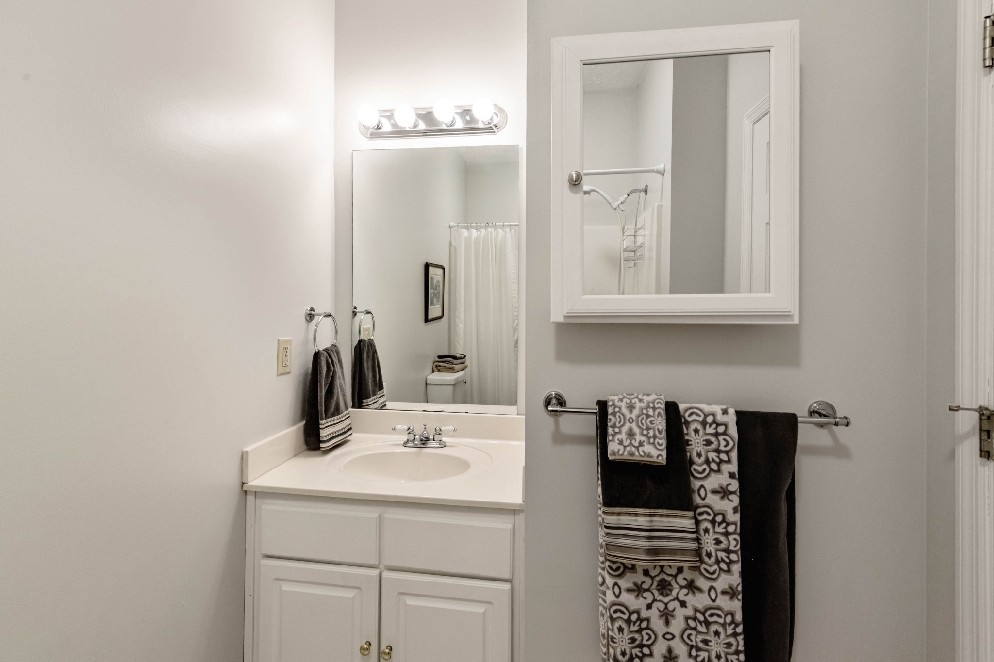 910 Churchill Crossing Madison, TN 37115 - Photo 12 of 25 a bathroom with a sink and a mirror