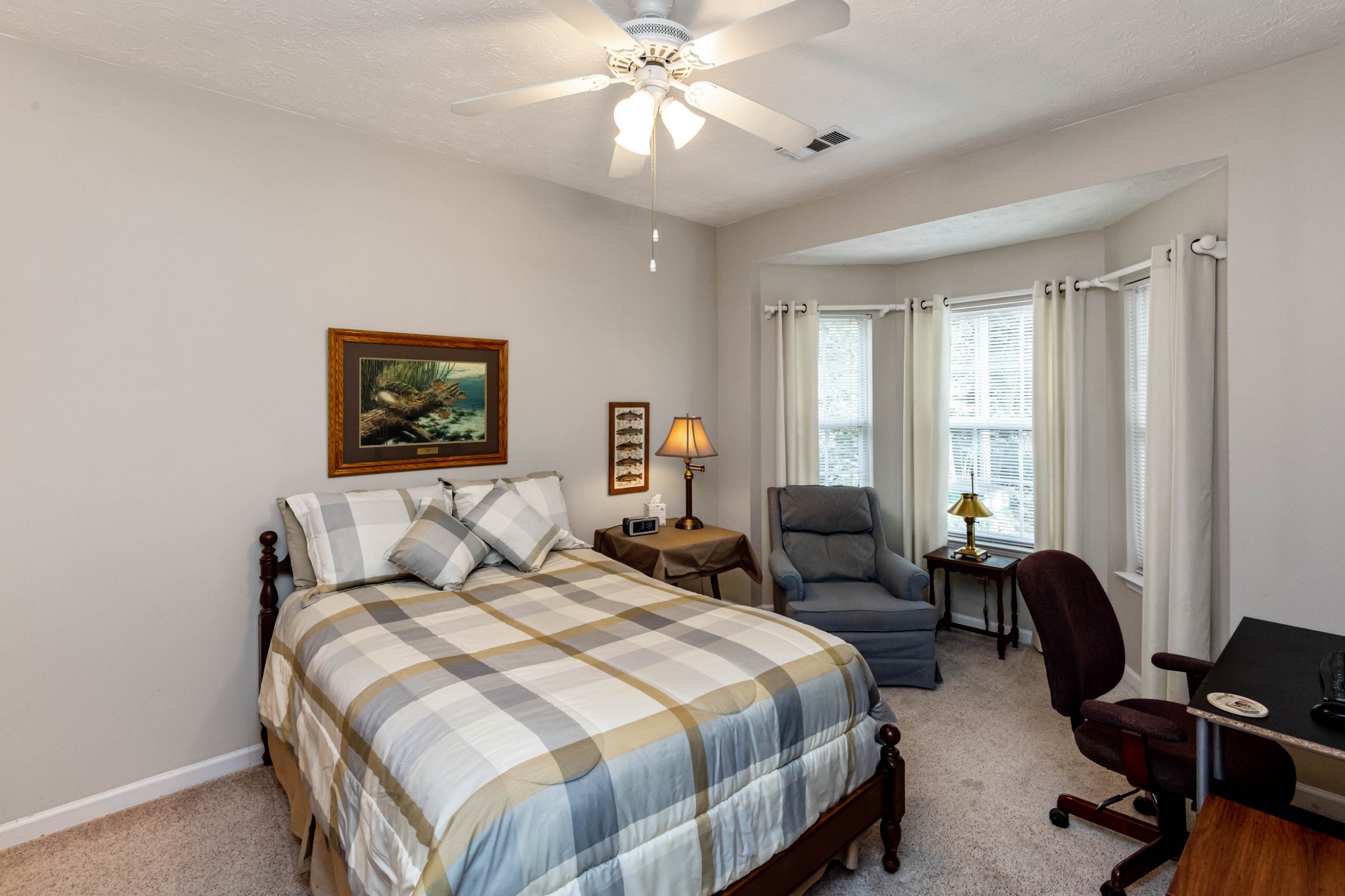 910 Churchill Crossing Madison, TN 37115 - Photo 14 of 25 a bedroom with a bed and a couch