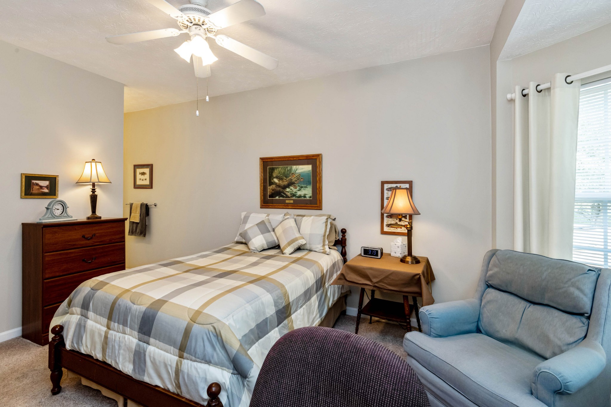 910 Churchill Crossing Madison, TN 37115 - Photo 15 of 25 a bedroom with a bed and a couch