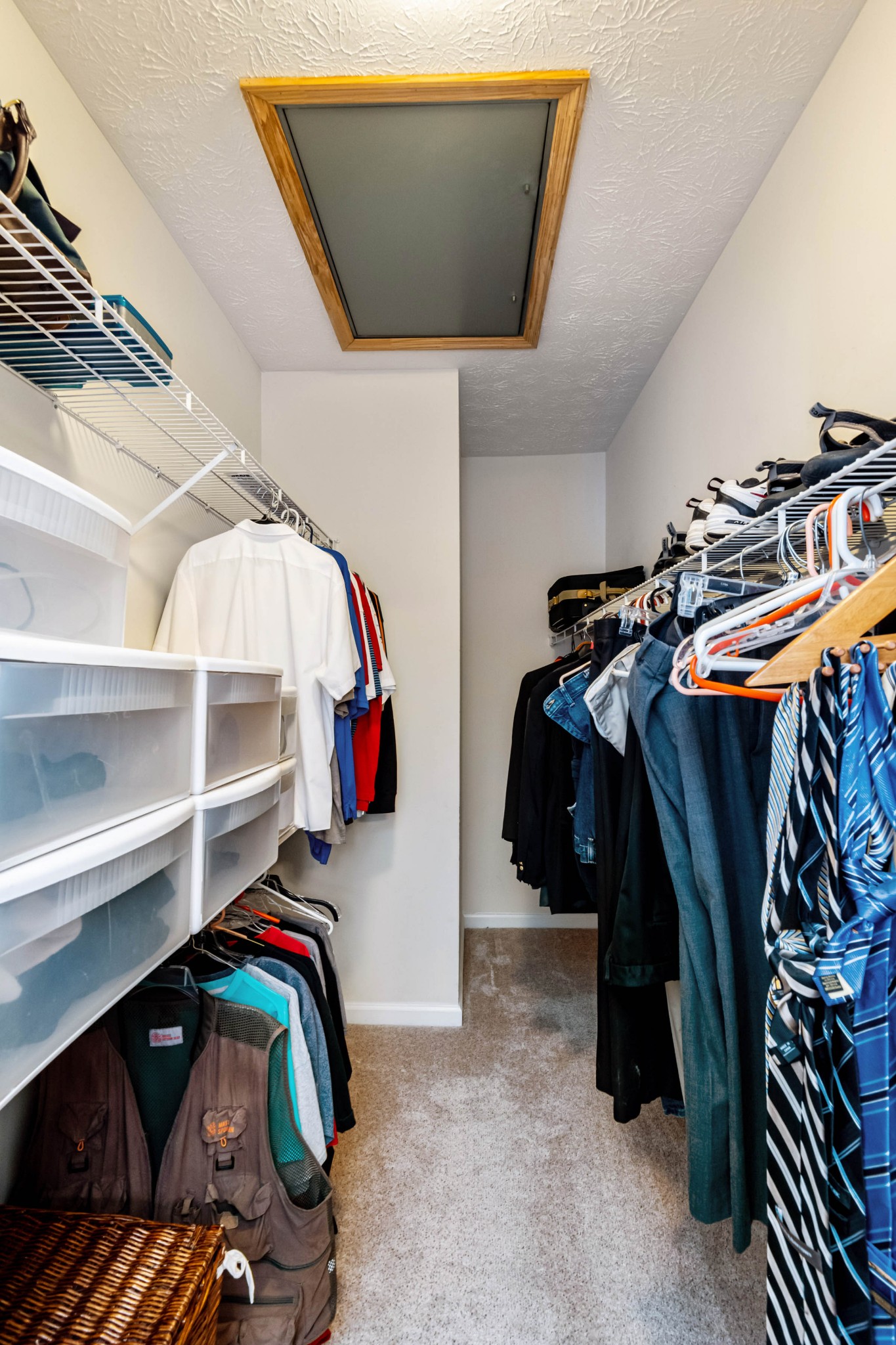 910 Churchill Crossing Madison, TN 37115 - Photo 17 of 25 a view of walk in closet with clothes and shoes