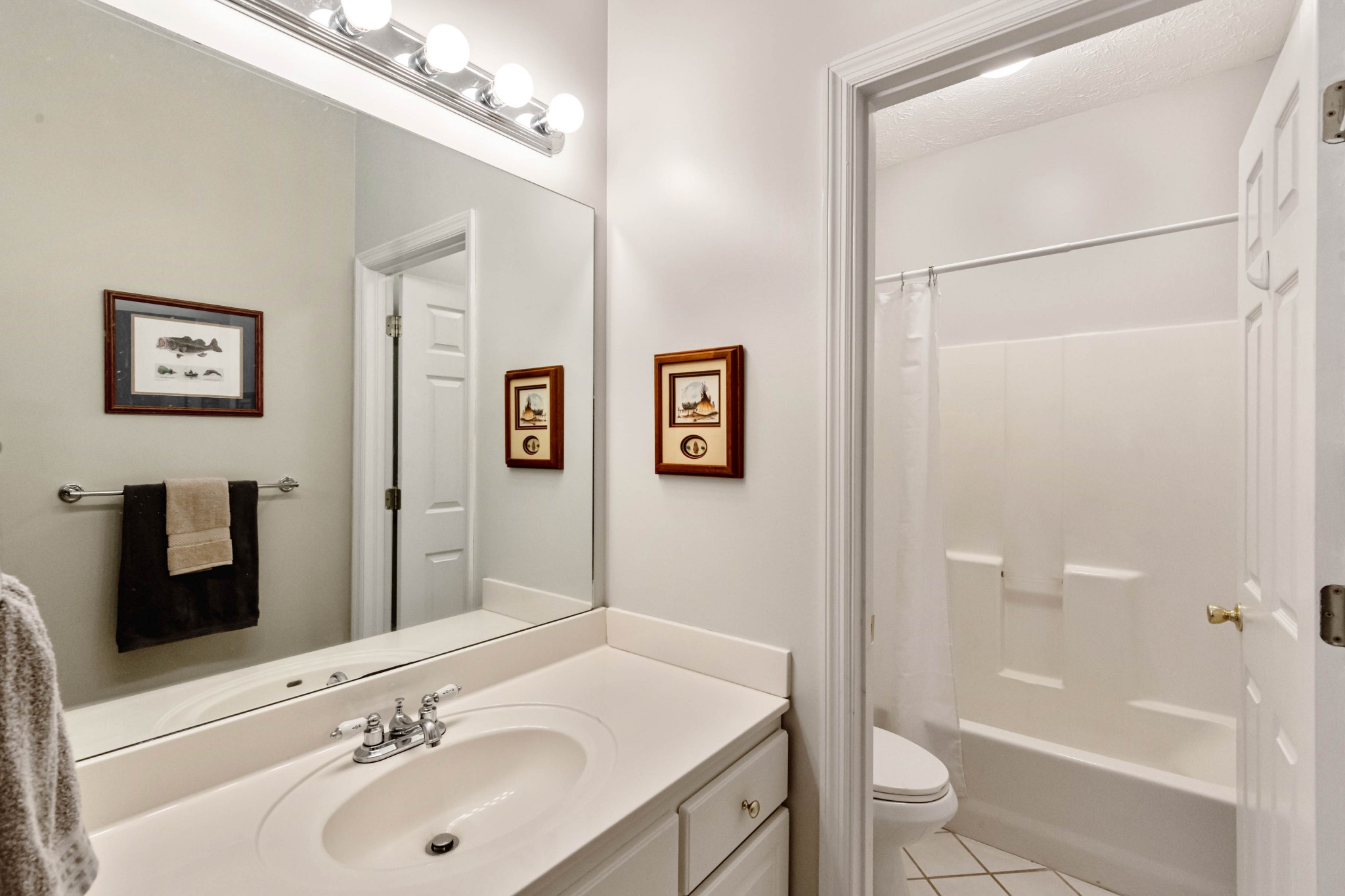 910 Churchill Crossing Madison, TN 37115 - Photo 18 of 25 a bathroom with a sink toilet and shower