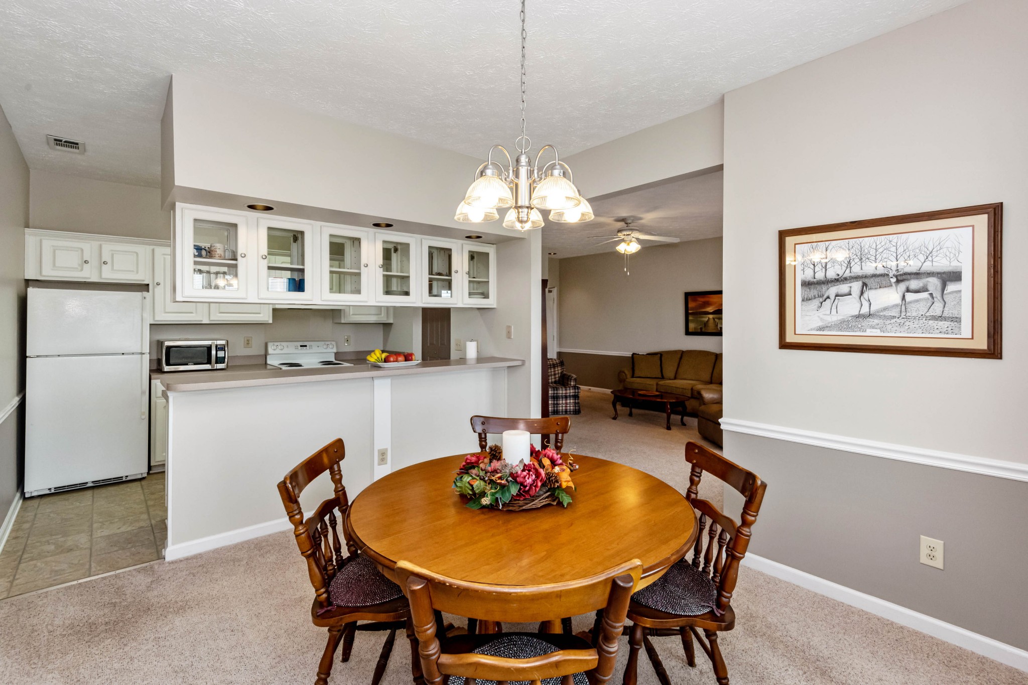 910 Churchill Crossing Madison, TN 37115 - Photo 7 of 25 a view of a dining room with furniture and a chandelier