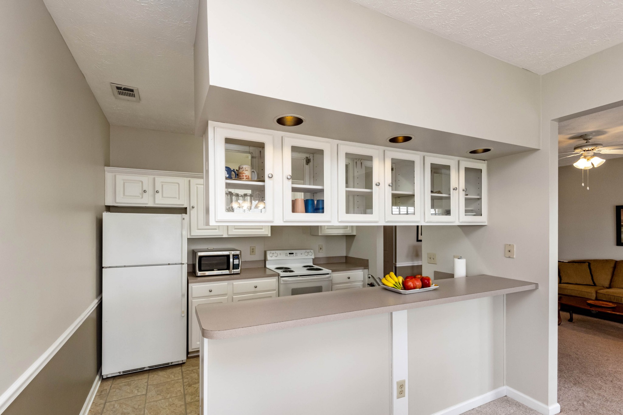910 Churchill Crossing Madison, TN 37115 - Photo 8 of 25 a kitchen with stainless steel appliances granite countertop a refrigerator and a sink