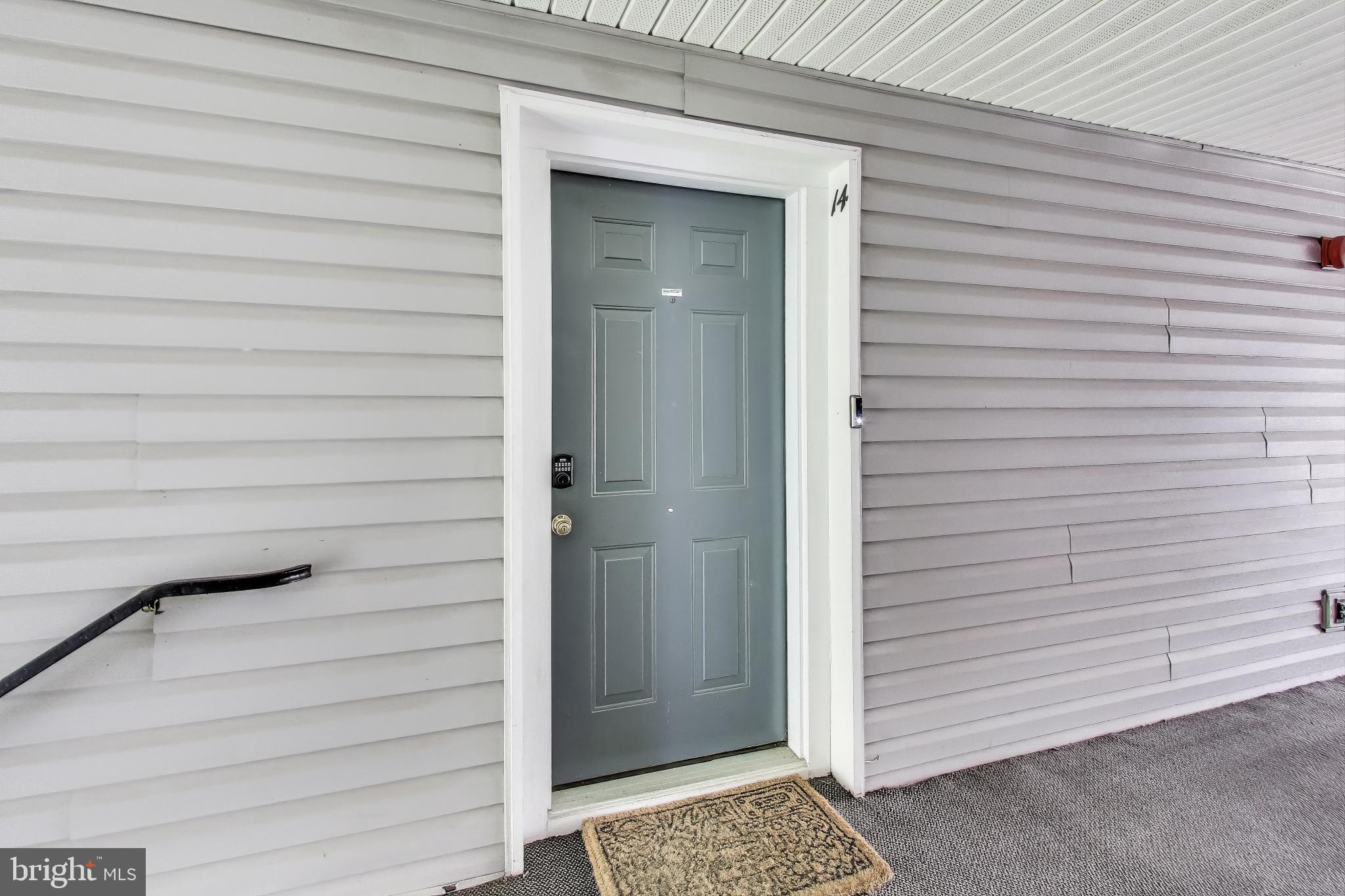 10021 Vanderbilt Circle, Unit 14 Rockville, MD 20850 - Photo 25 of 31 a view of front door
