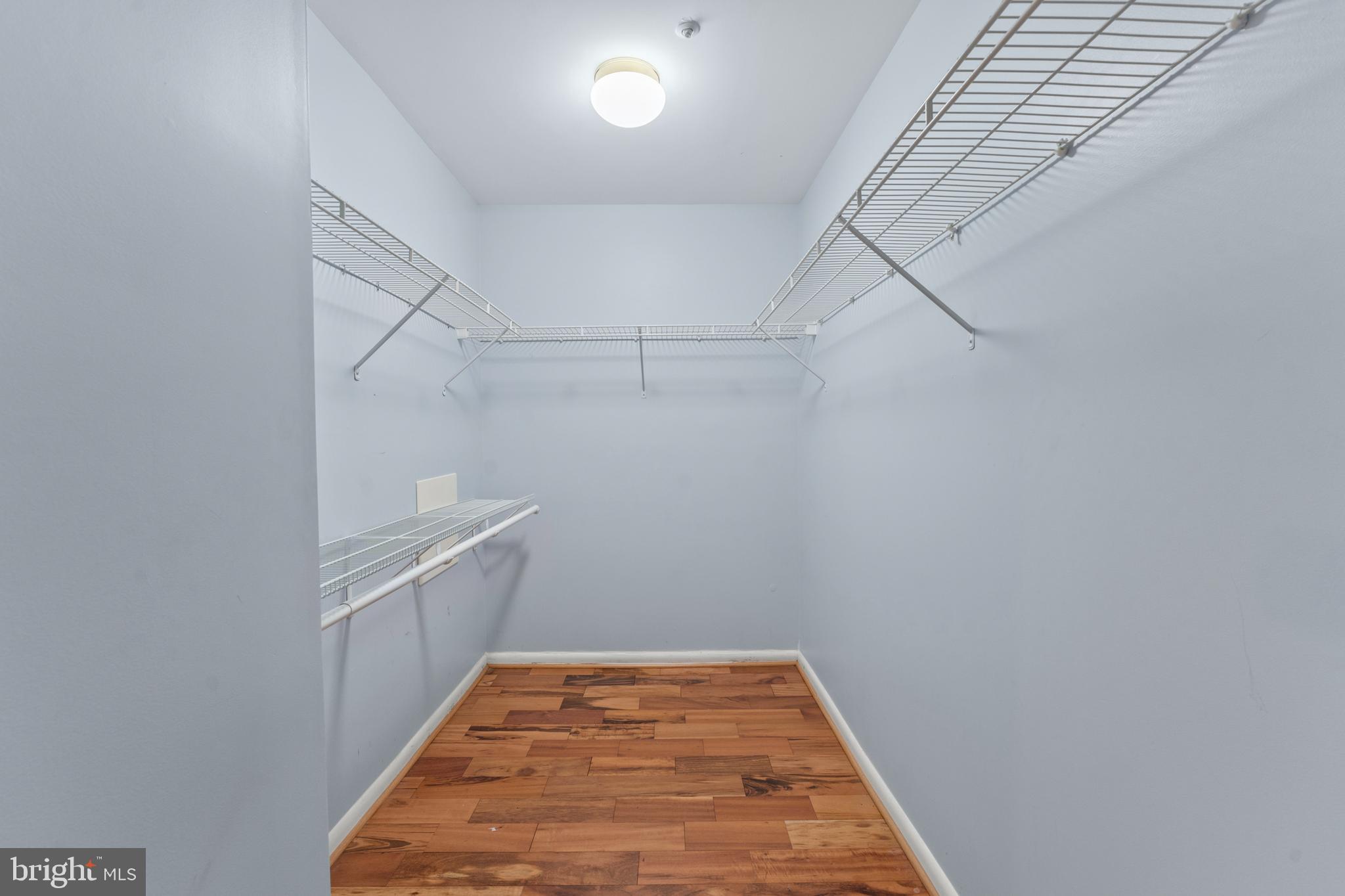 3421 Hewitt Avenue, Unit 2202 Silver Spring, MD 20906 - Photo 25 of 31 a view of a room with racks on the wall