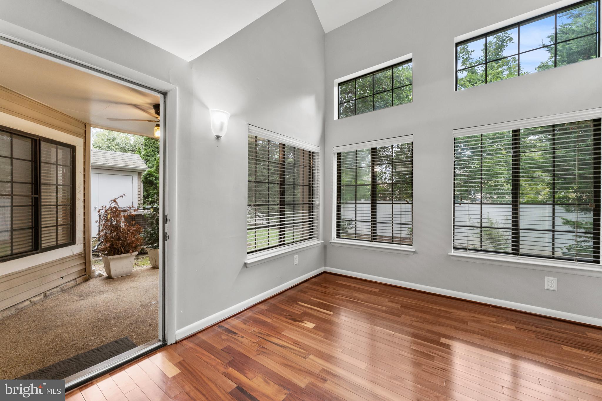 3421 Hewitt Avenue, Unit 2202 Silver Spring, MD 20906 - Photo 9 of 31 a view of empty room with wooden floor and fan