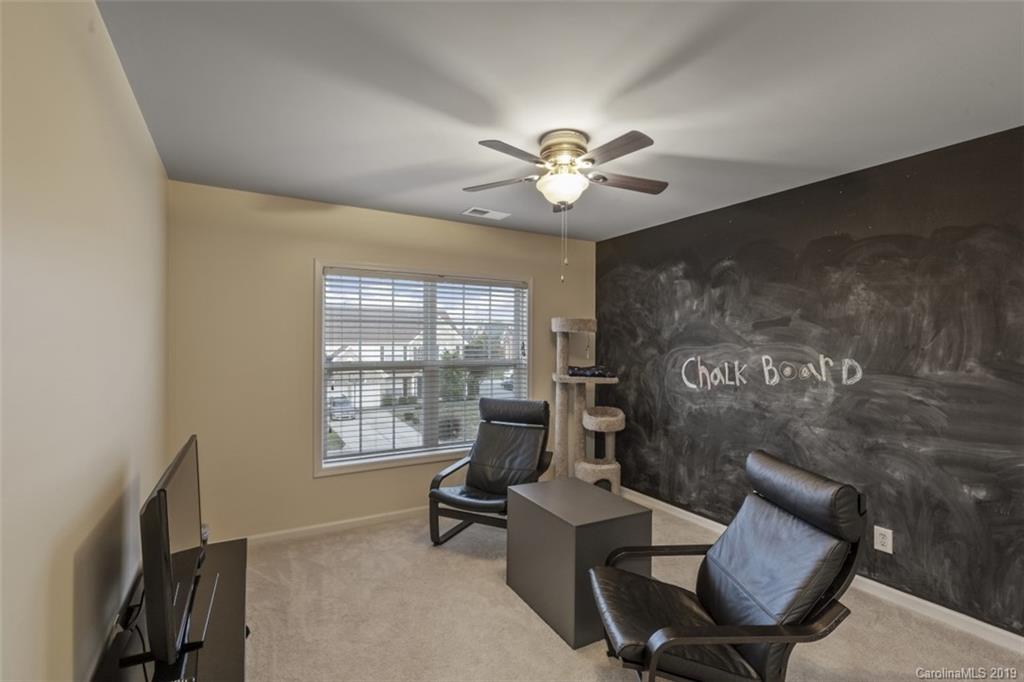 1559 Broderick Street Northwest Concord, NC 28027 - Photo 27 of 29 a living room with furniture