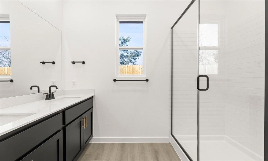 2205 Washington Street Princeton, TX 75407 - Photo 11 of 15 Primary Bathroom Representative Photo featuring the Noir Collection