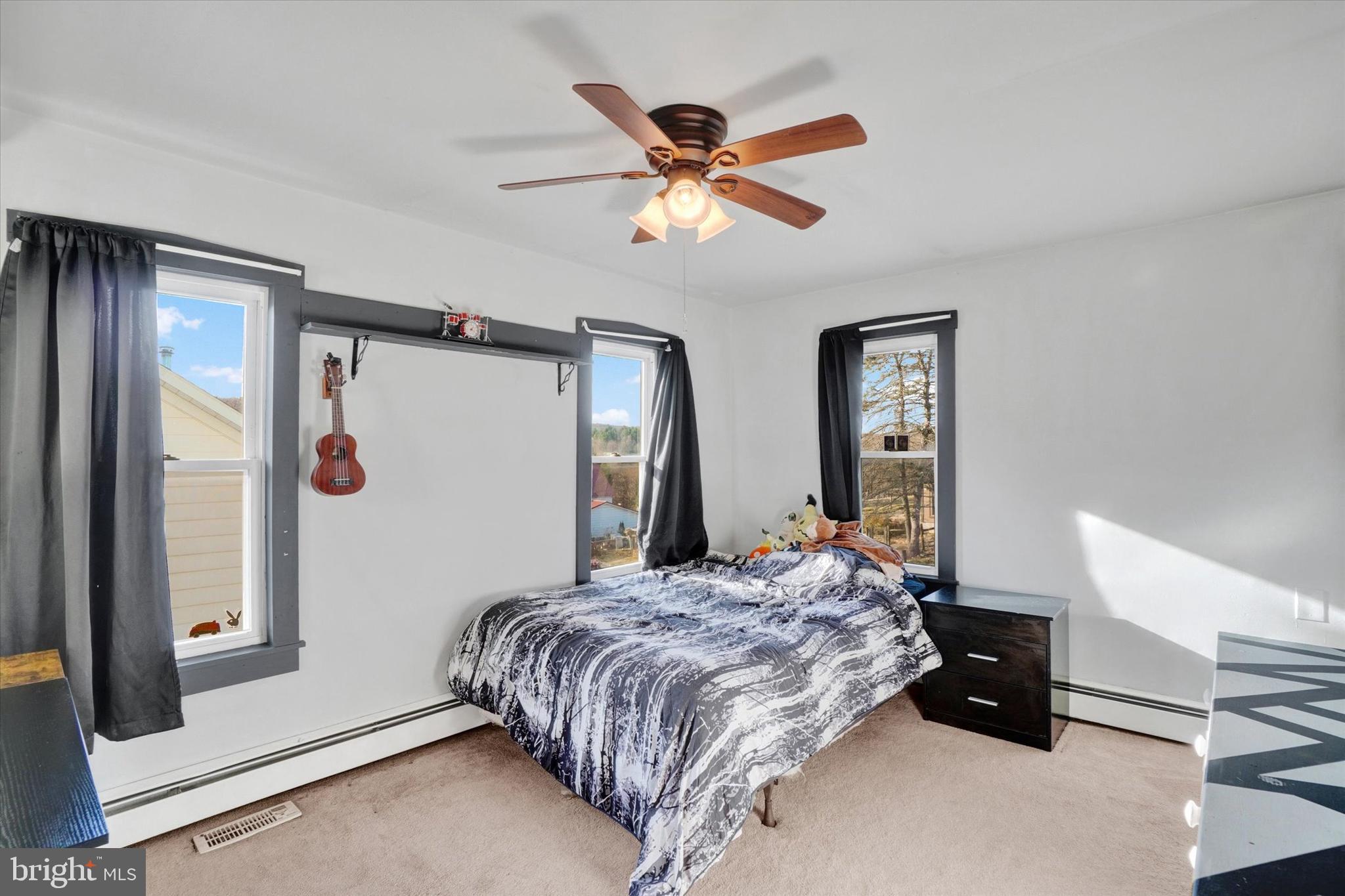 48 High Street Felton, PA 17322 - Photo 15 of 28 a bedroom with a bed and a window