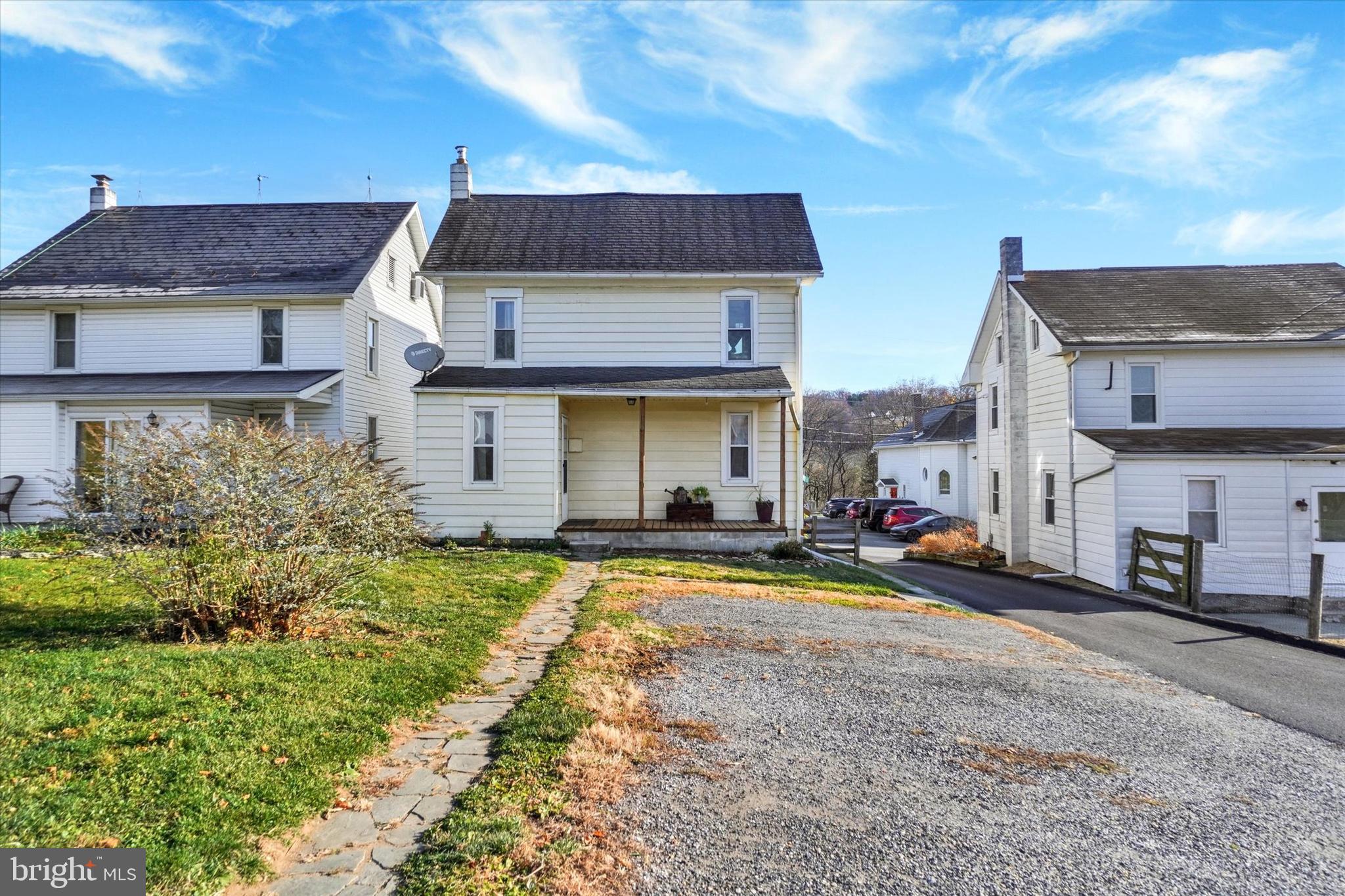 48 High Street Felton, PA 17322 - Photo 27 of 28 a view of a house with sitting area and large trees