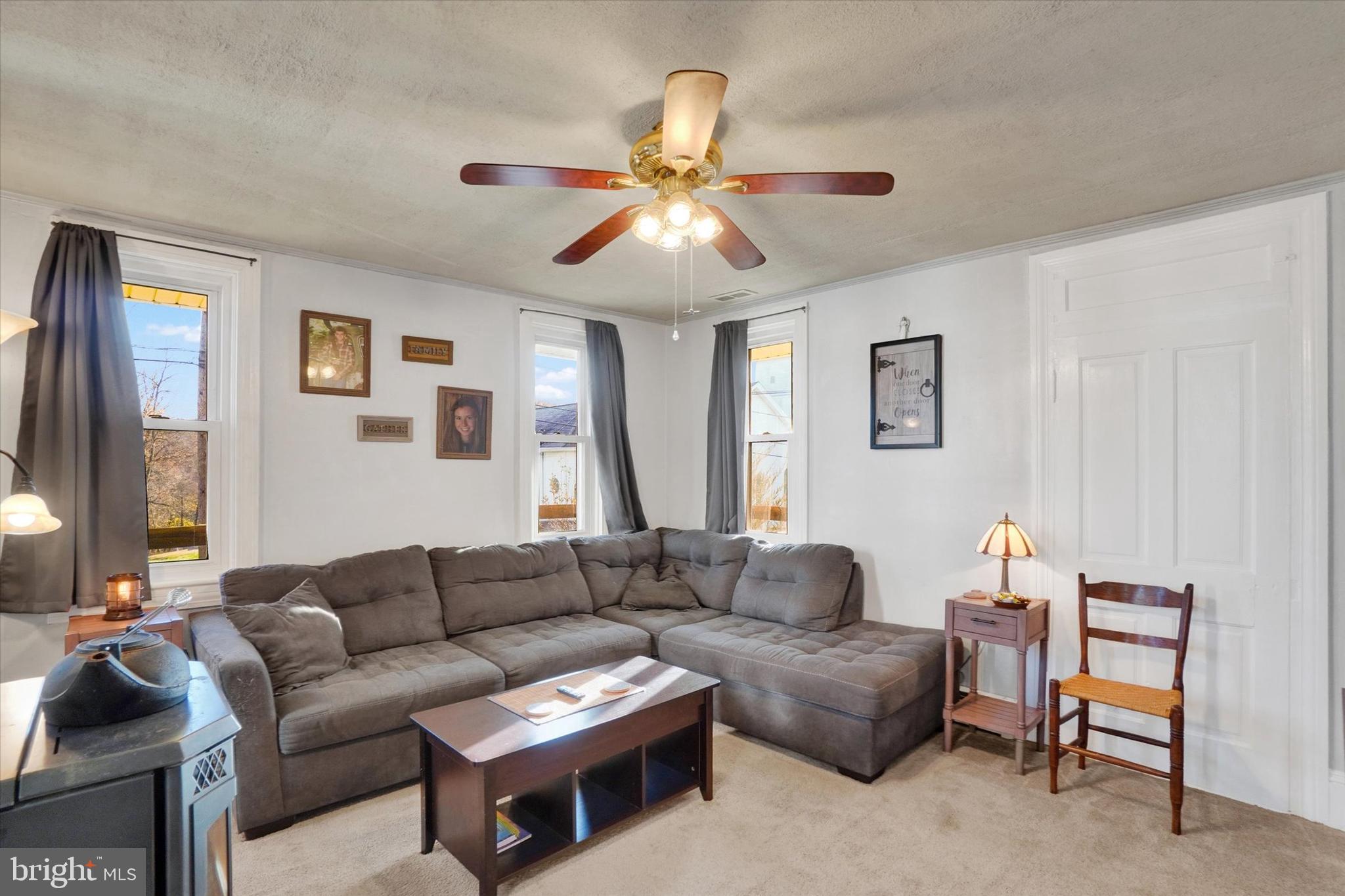 48 High Street Felton, PA 17322 - Photo 8 of 28 a living room with furniture and a window