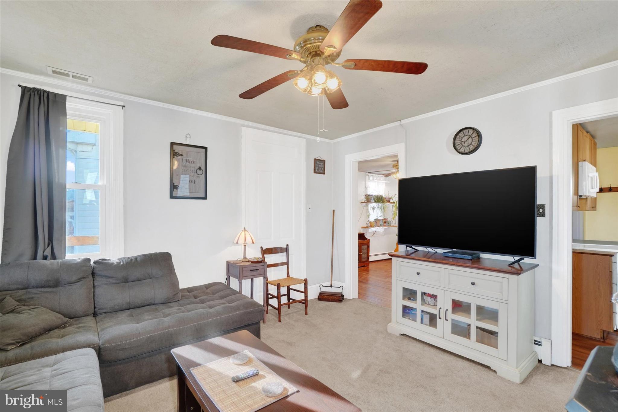 48 High Street Felton, PA 17322 - Photo 9 of 28 a living room with furniture and a flat screen tv