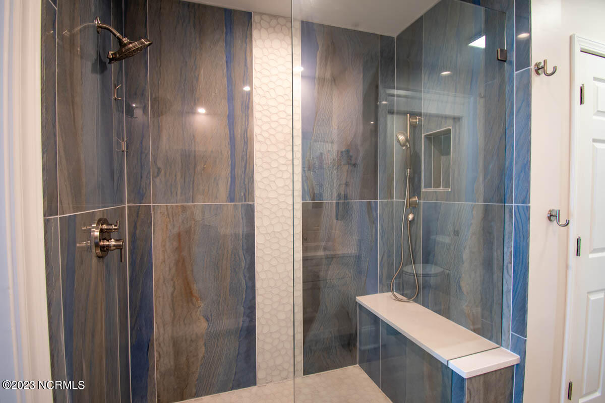 1435 Salter Path Road, Unit I 2 Indian Beach, NC 28512 - Photo 2 of 54 $35,000 new primary bathroom update in 2023.