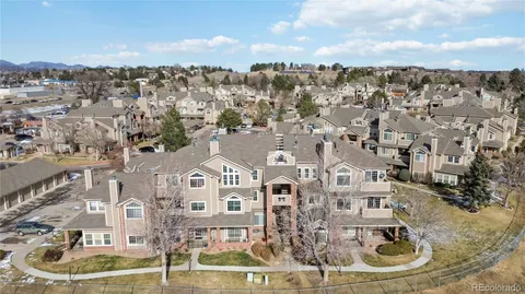 a view of multiple houses with a city street