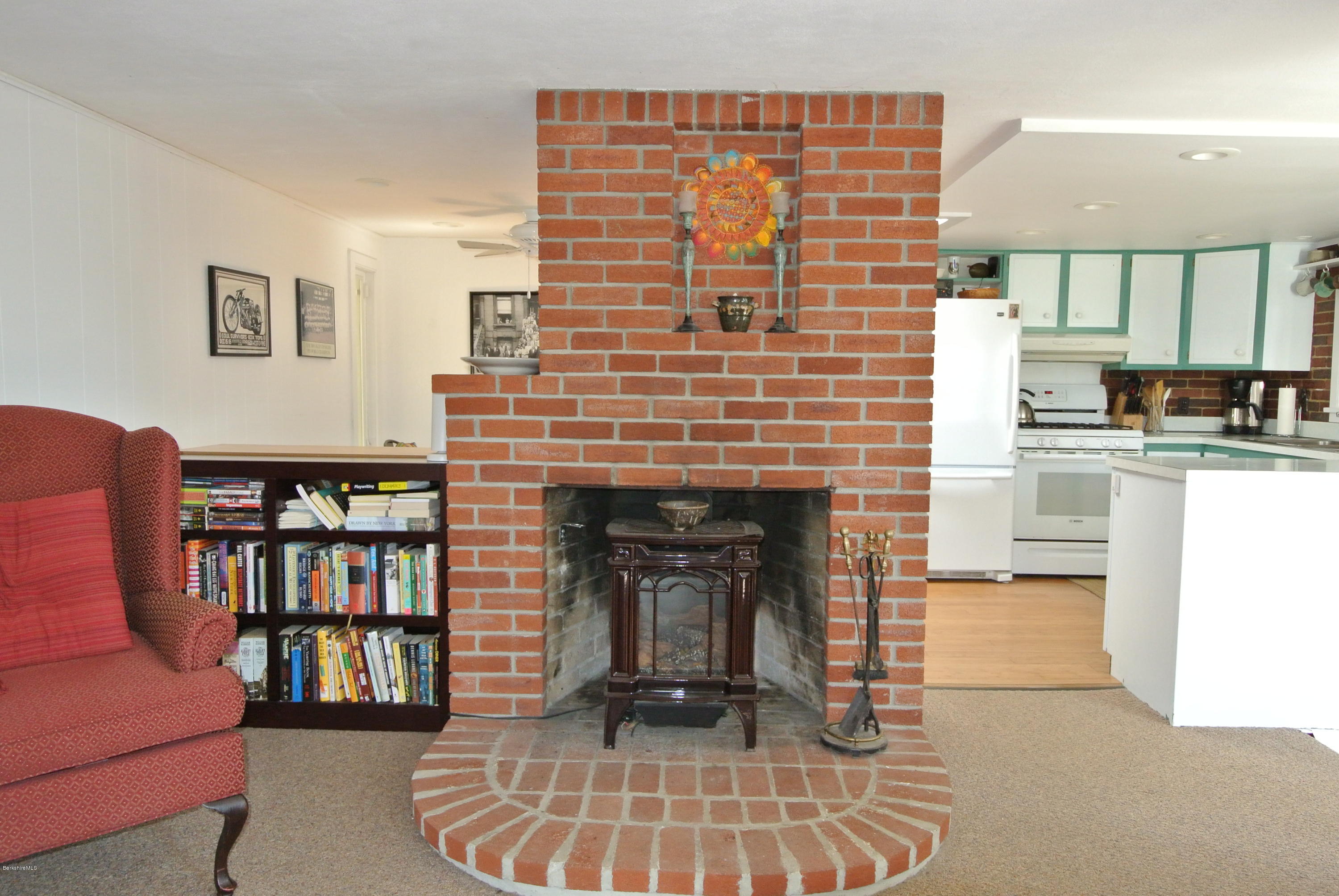 6 Mahkeenac Road Stockbridge, MA 01262 - Photo 13 of 20 a living room with furniture and a fireplace