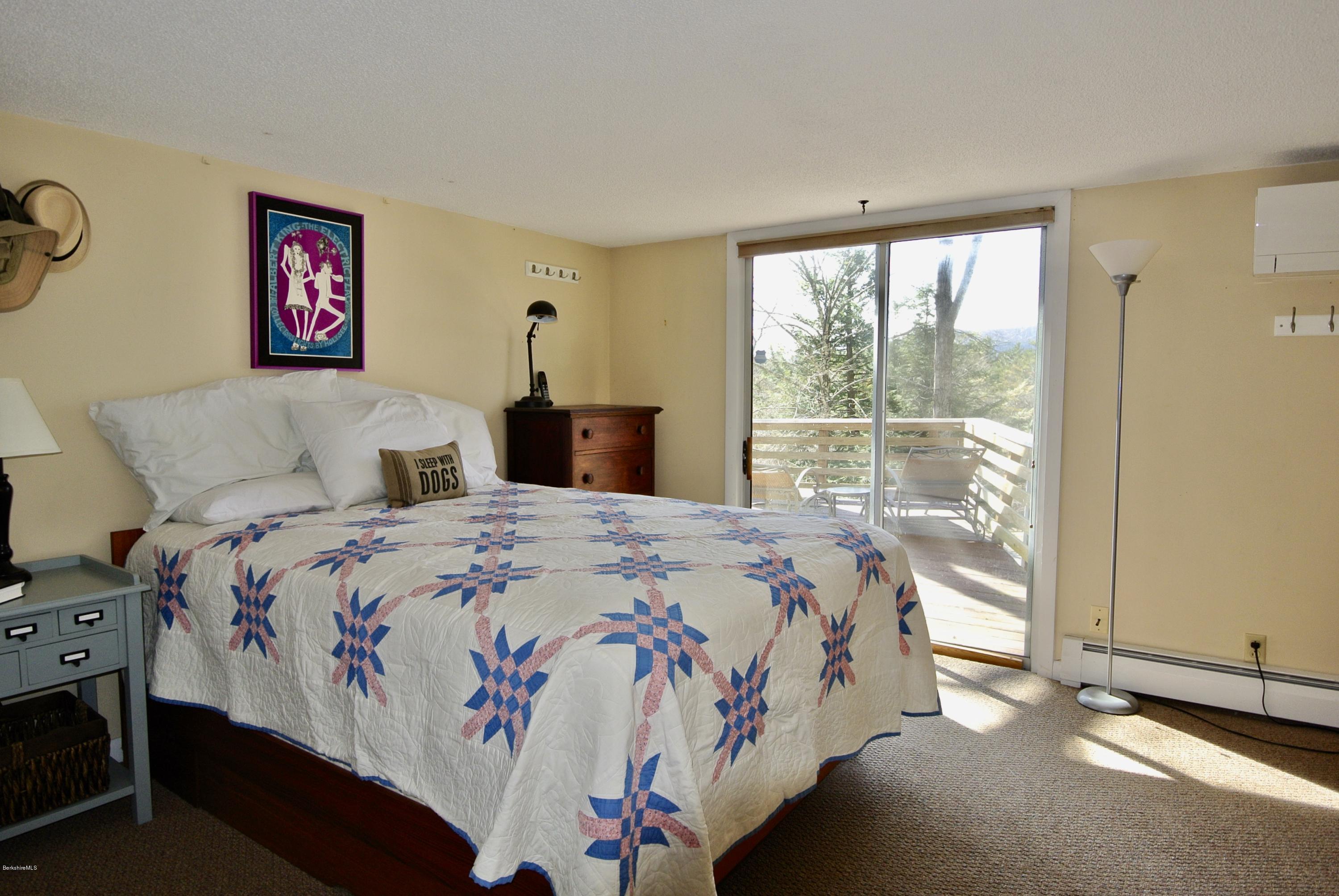 6 Mahkeenac Road Stockbridge, MA 01262 - Photo 15 of 20 a bedroom with a bed and window