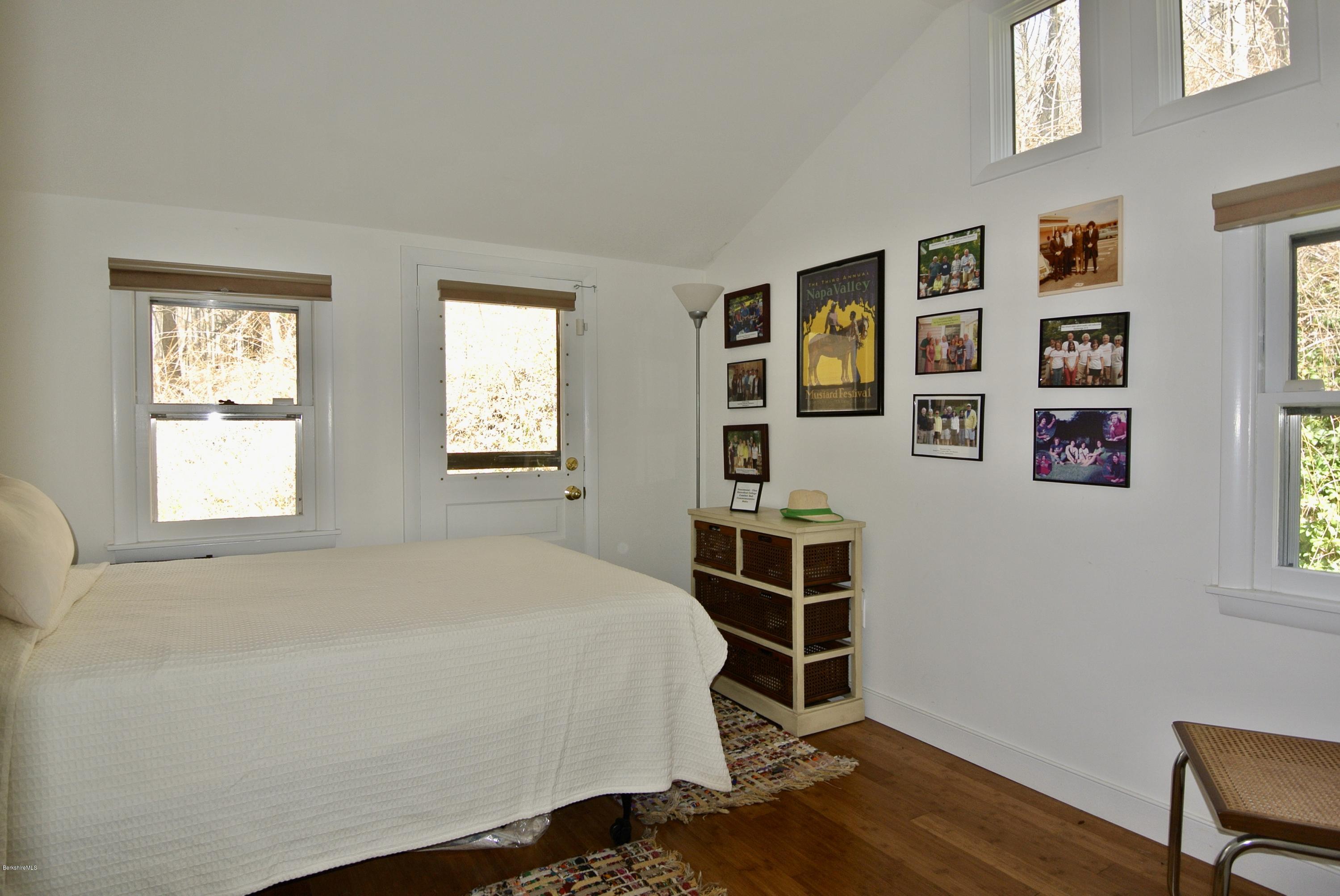 6 Mahkeenac Road Stockbridge, MA 01262 - Photo 18 of 20 a bedroom with a bed and a window