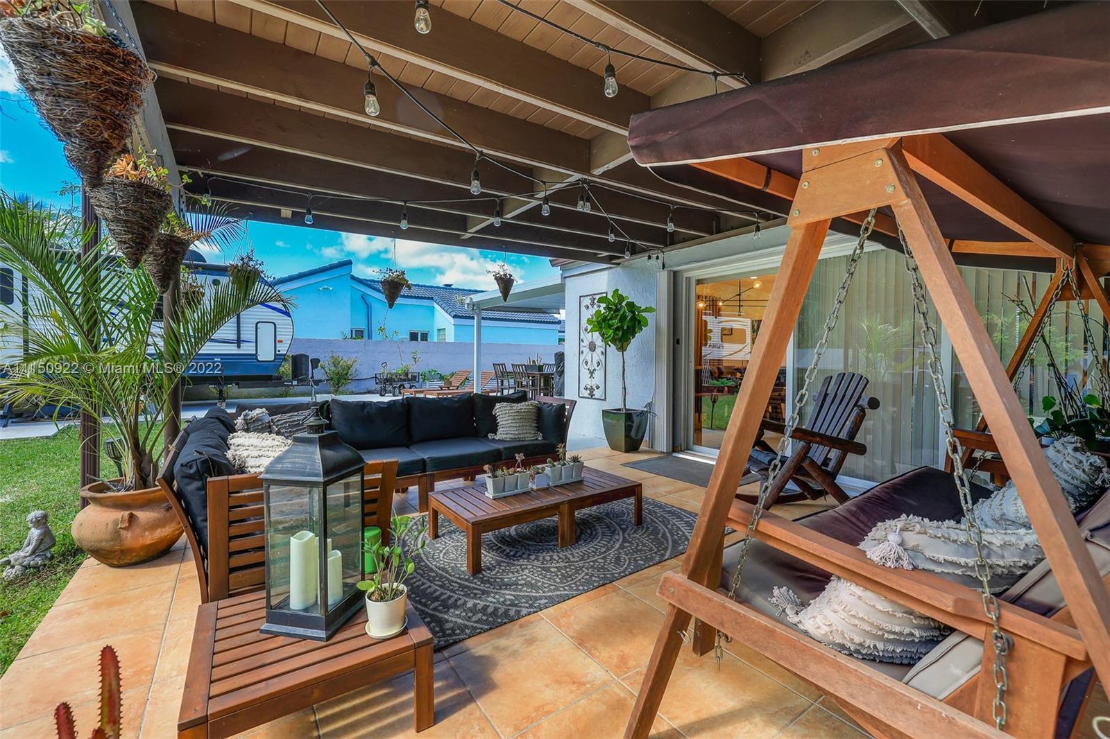 15534 Southwest 153rd Street Miami, FL 33187 - Photo 35 of 44 a view of an outdoor sitting area