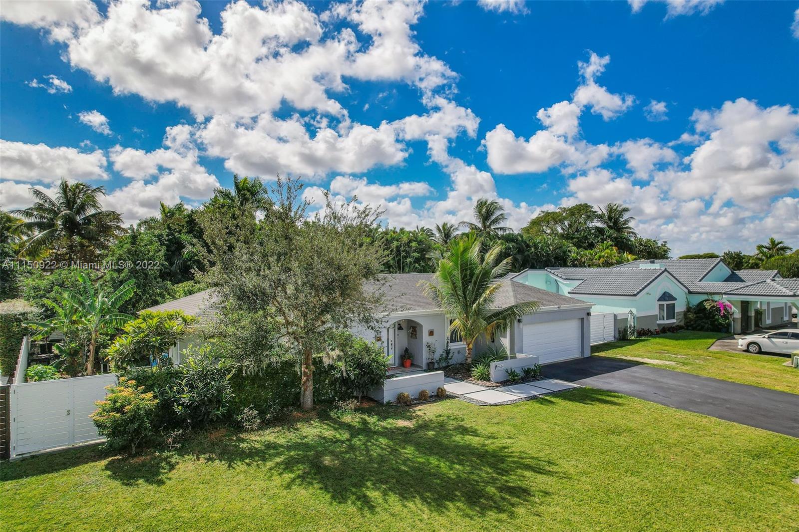 15534 Southwest 153rd Street Miami, FL 33187 - Photo 38 of 44 a view of a house with swimming pool and sitting area