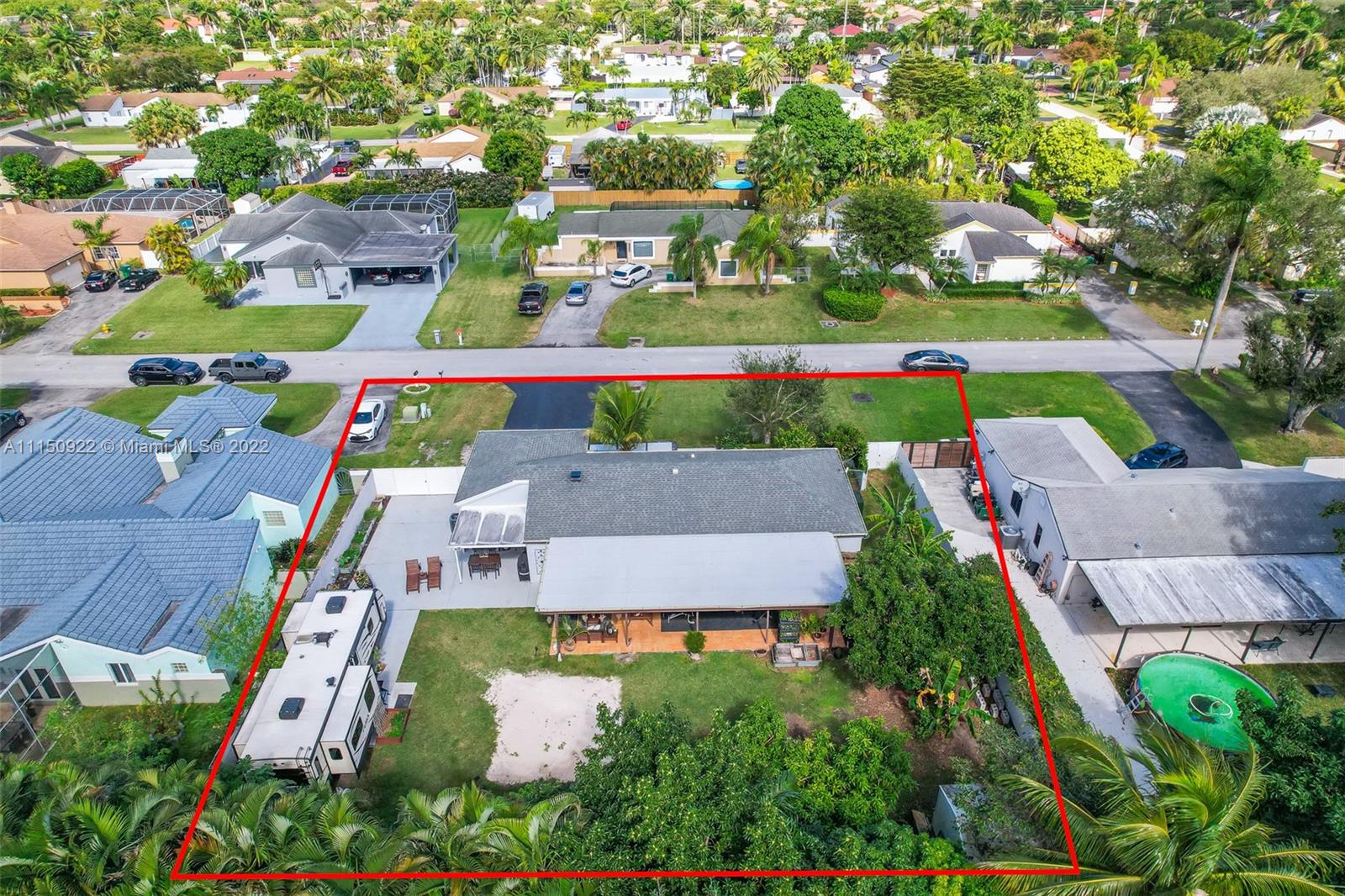 15534 Southwest 153rd Street Miami, FL 33187 - Photo 40 of 44 an aerial view of a house with a garden