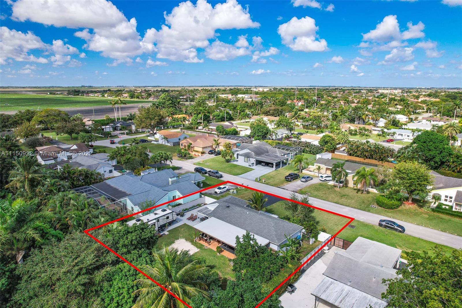 15534 Southwest 153rd Street Miami, FL 33187 - Photo 41 of 44 an aerial view of residential houses with outdoor space and river