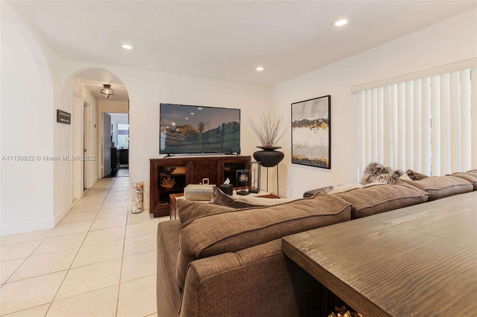 15534 Southwest 153rd Street Miami, FL 33187 - Photo 5 of 44 a living room with furniture