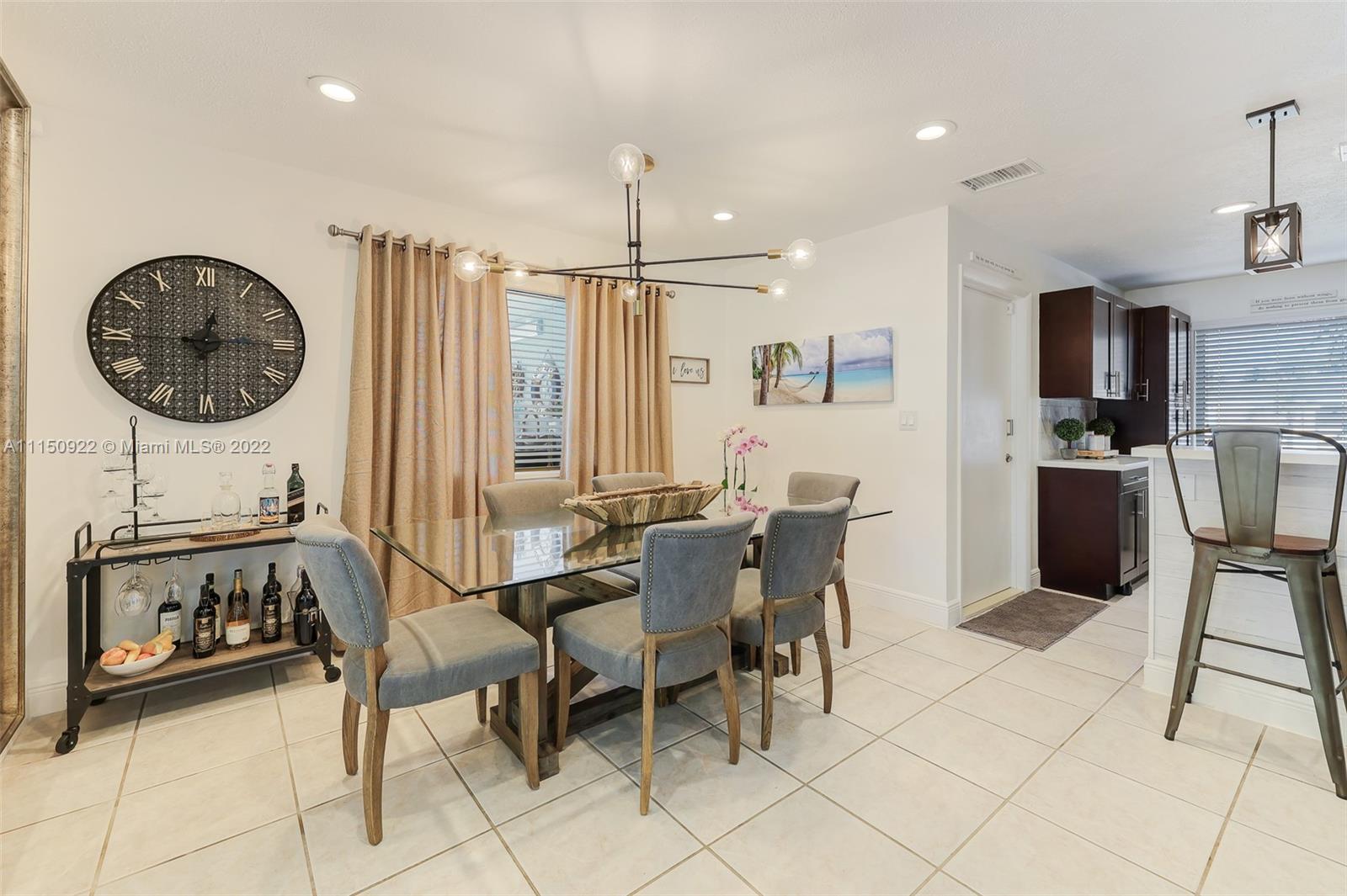 15534 Southwest 153rd Street Miami, FL 33187 - Photo 8 of 44 a view of a dining room with furniture