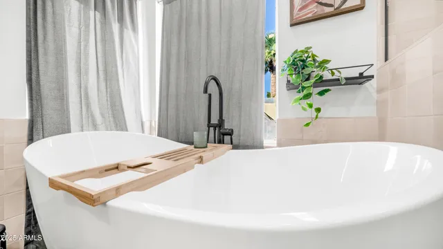 a kitchen with a refrigerator and cabinets