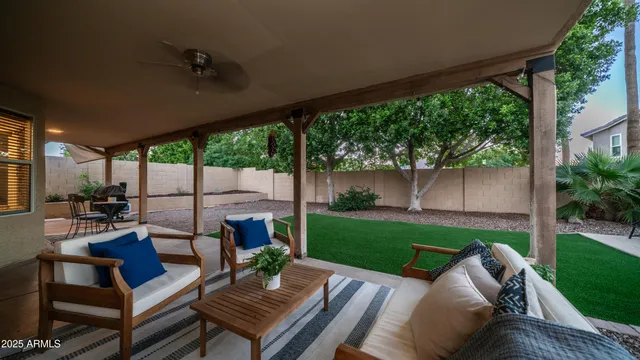 a house view with swimming pool and sitting space