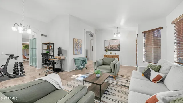 a kitchen with stainless steel appliances a refrigerator stove and microwave