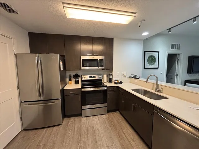 $235,000 | 14501 Grove Resort Avenue, Unit 3230, Winter Garden, FL 34787