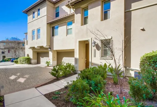 a front view of a multi story residential apartment building