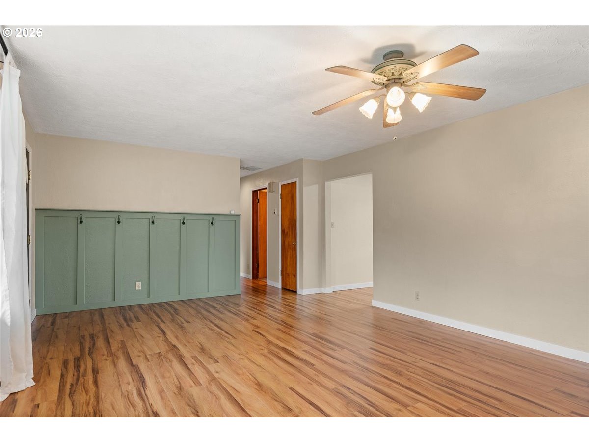 1611 Main Street Lyons, OR 97358 - Photo 11 of 48 a view of an empty room and wooden floor