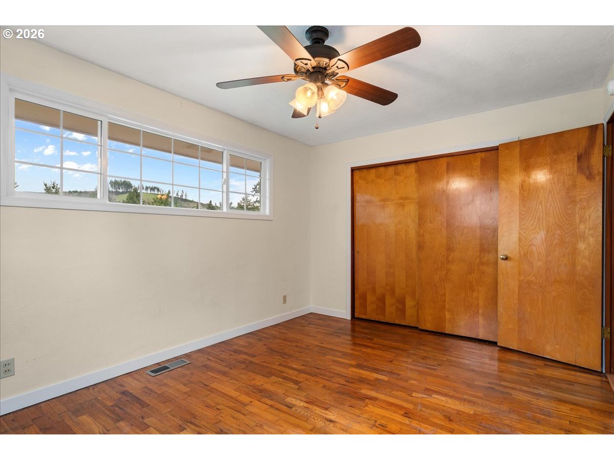 1611 Main Street Lyons, OR 97358 - Photo 25 of 48 a view of an empty room with a window