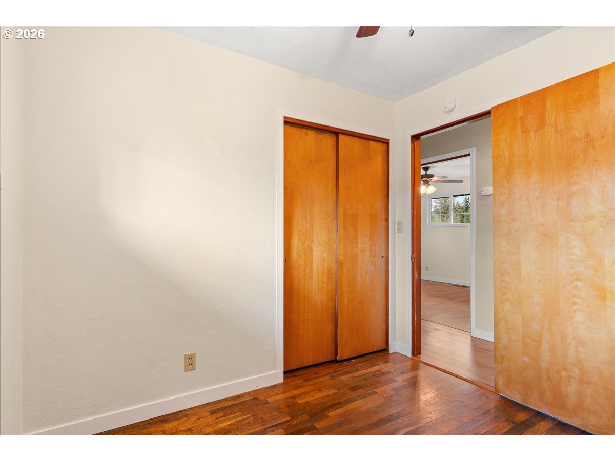 1611 Main Street Lyons, OR 97358 - Photo 30 of 48 a view of an empty room with wooden floor