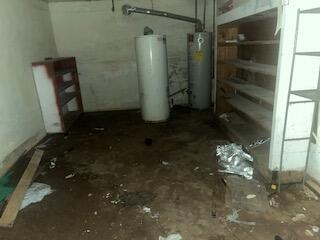 206 South White Street Floydada, TX 79235 - Photo 11 of 16 a bathroom with a sink