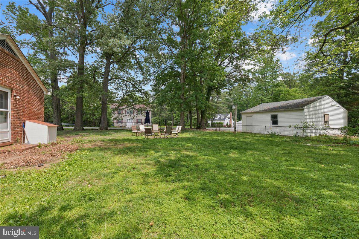 319 Gambrills Road Gambrills, MD 21054 - Photo 33 of 35 a front view of house with yard and green space