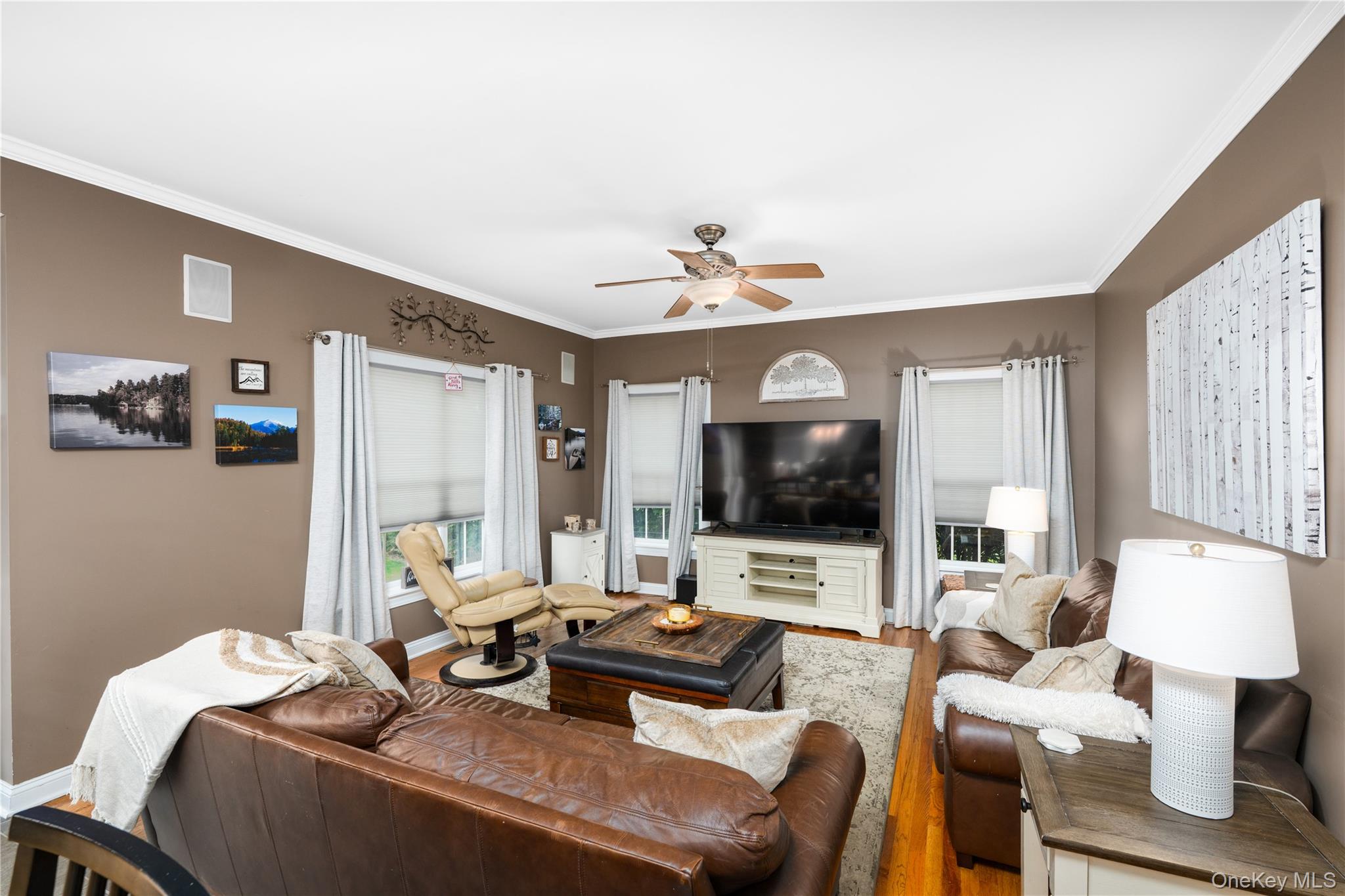 60 Idlewild Road Marlboro, NY 12542 - Photo 15 of 37 Spacious living area featuring warm neutral wall tones and crown molding
