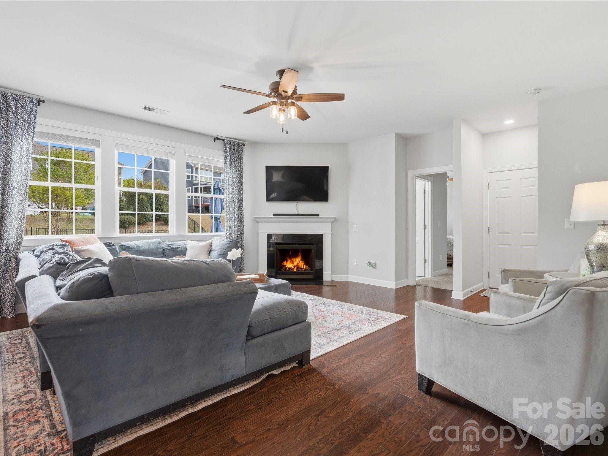 932 Twin Valley Way Fort Mill, SC 29715 - Photo 14 of 48 a living room with furniture and a fireplace