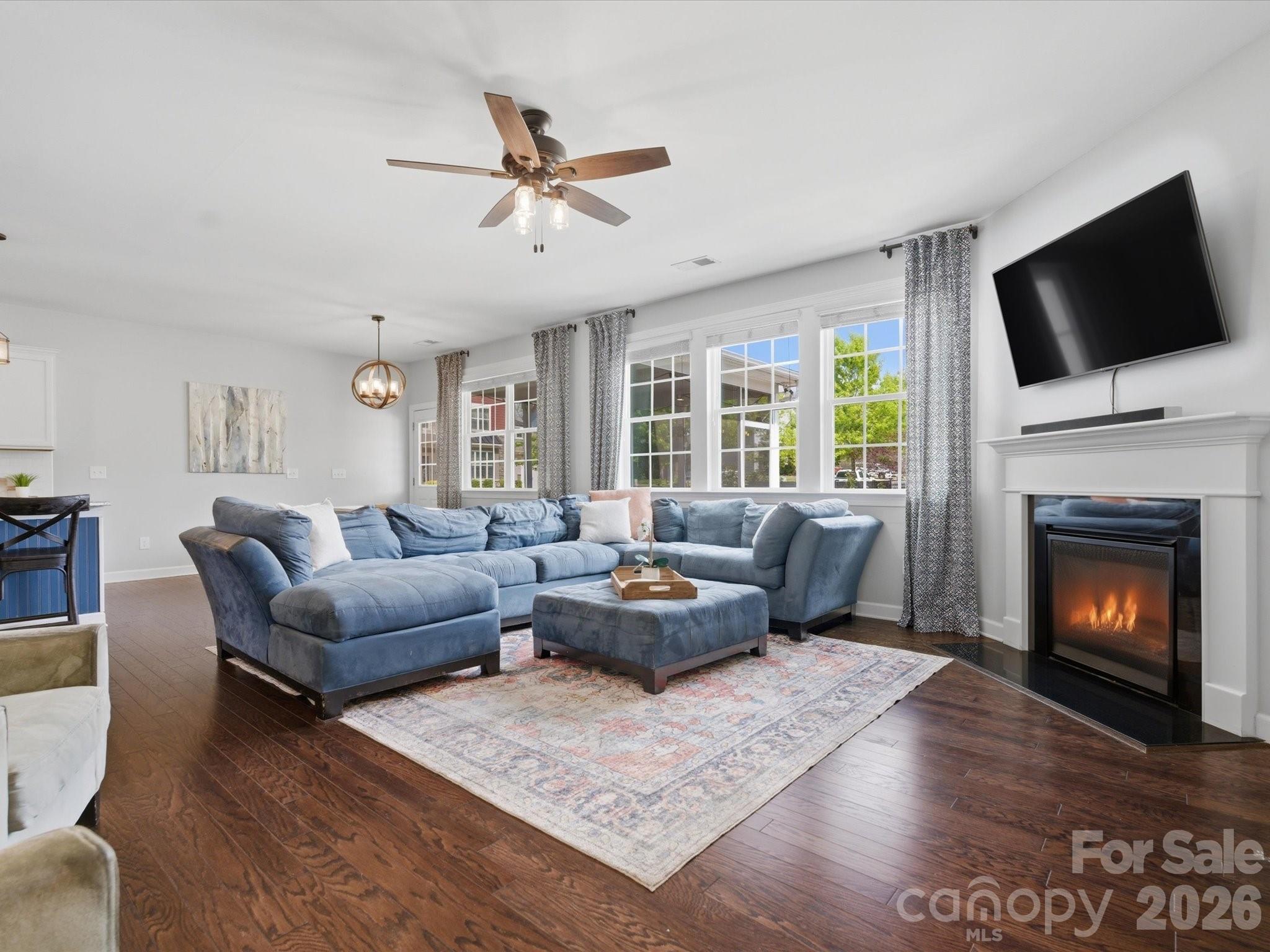 932 Twin Valley Way Fort Mill, SC 29715 - Photo 15 of 48 a living room with furniture fireplace and flat screen tv