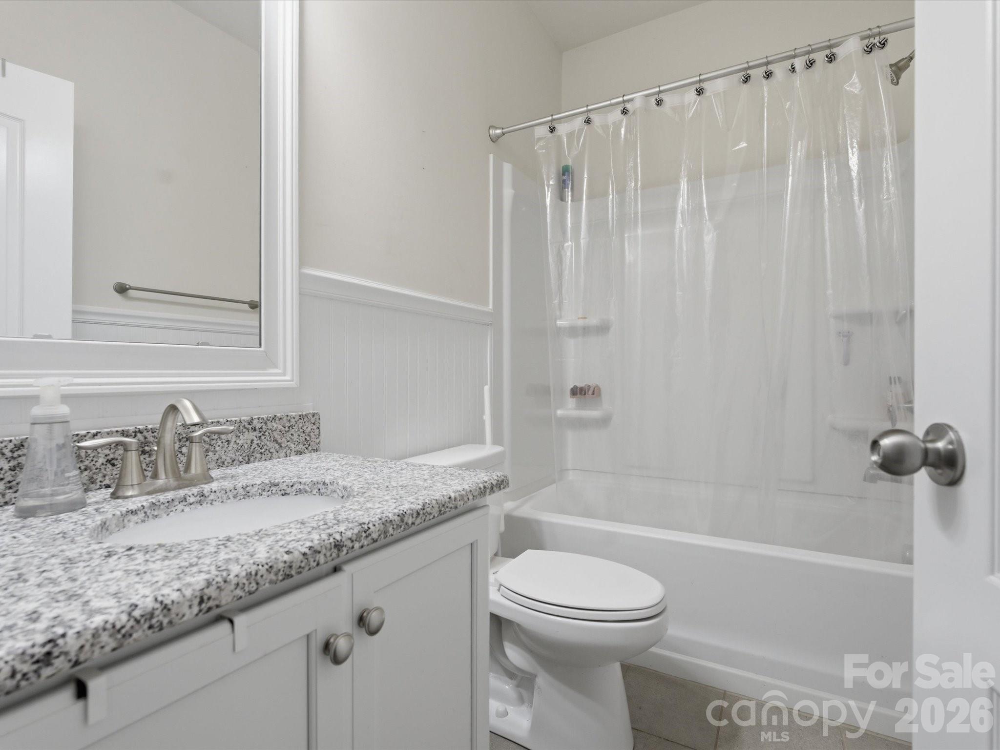 932 Twin Valley Way Fort Mill, SC 29715 - Photo 19 of 48 a bathroom with a granite countertop sink toilet and shower