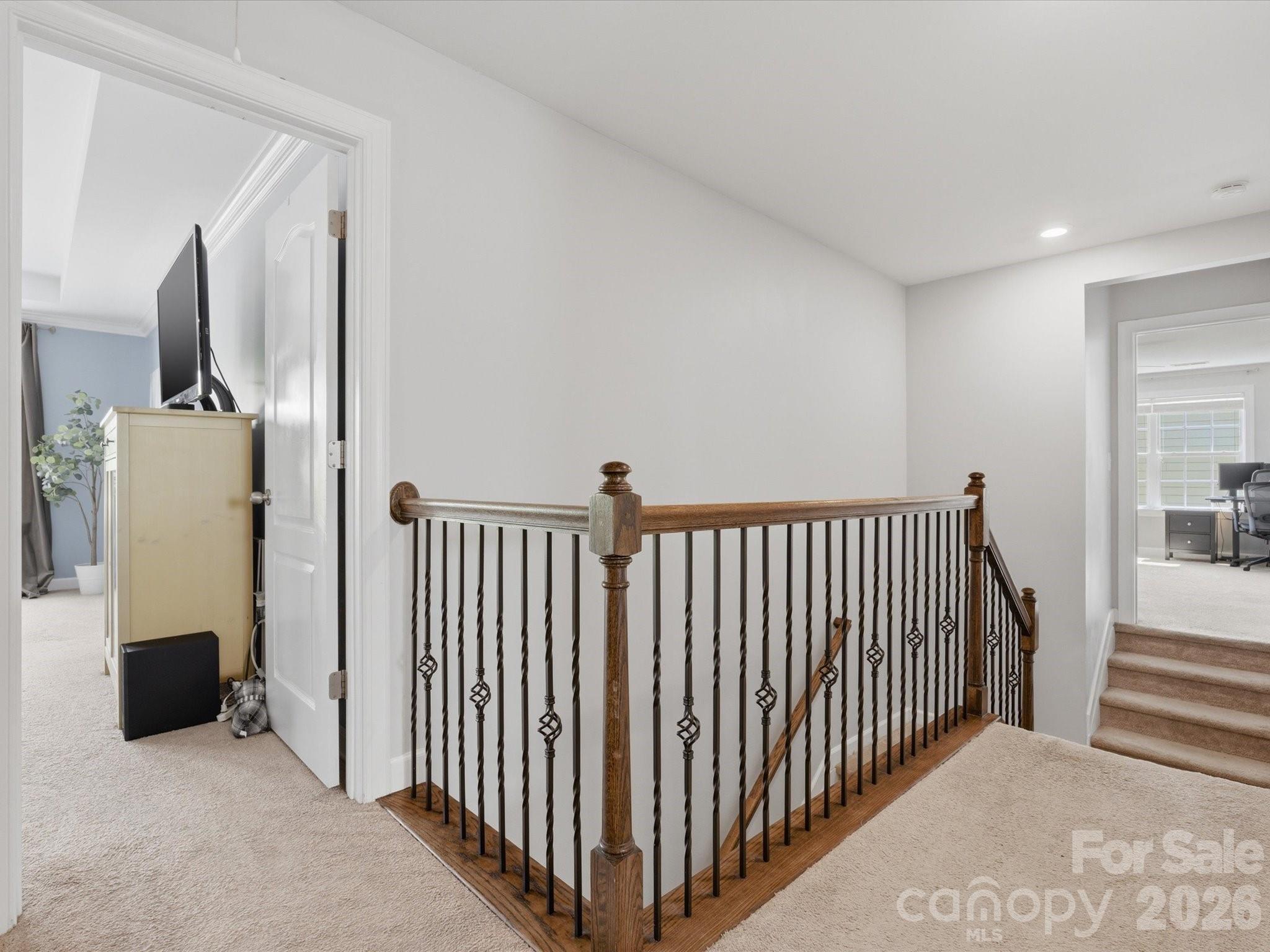 932 Twin Valley Way Fort Mill, SC 29715 - Photo 20 of 48 a view of a hallway with windows and stairs