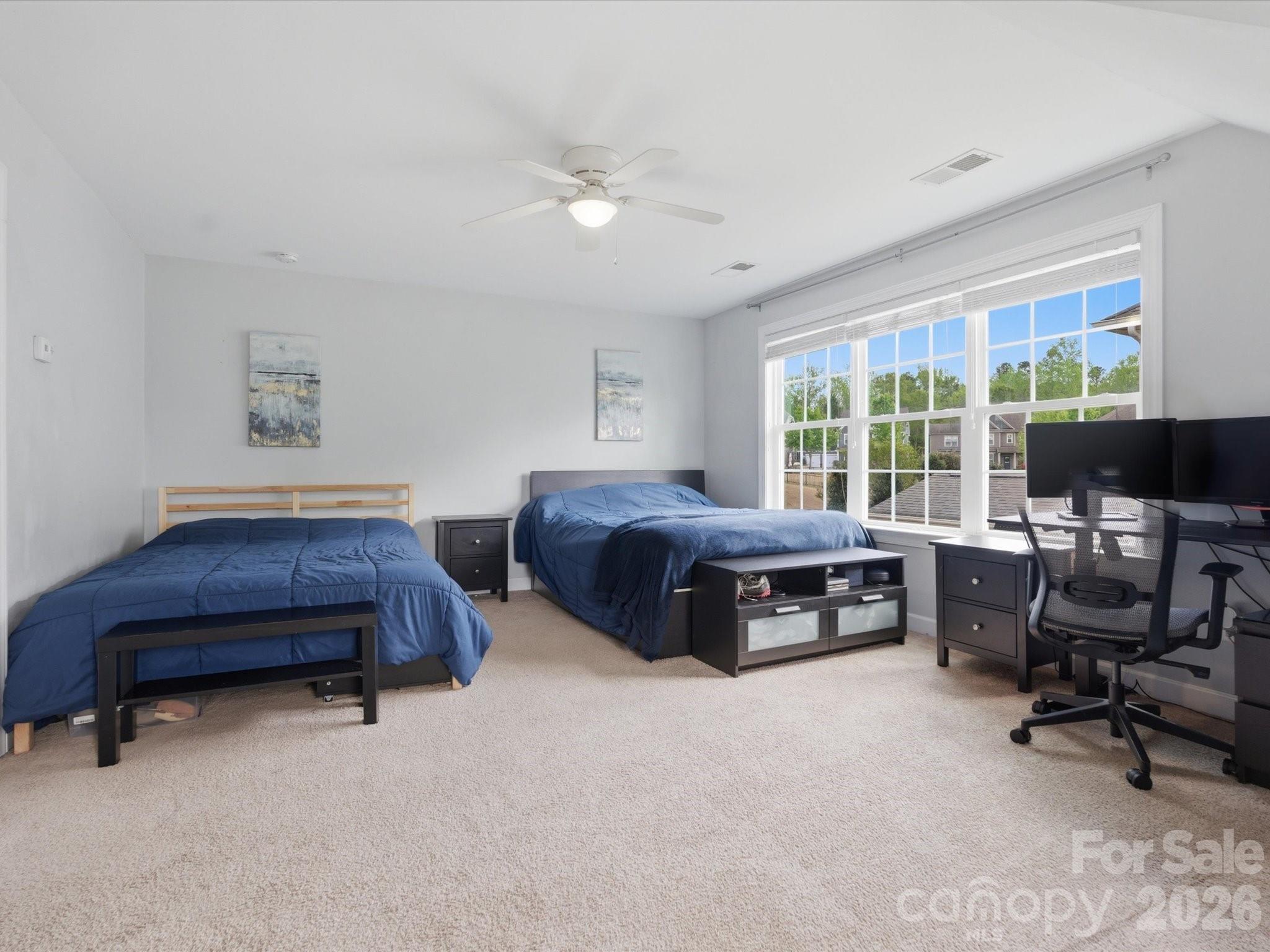 932 Twin Valley Way Fort Mill, SC 29715 - Photo 25 of 48 a bed room with furniture and a window